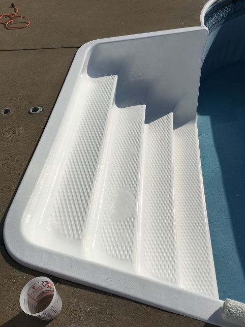 newly repaired swimming pool steps